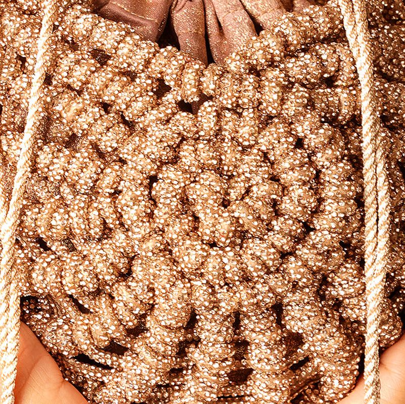 Close-up of a glittery gold macrame bag knots  - Palette by Rishma