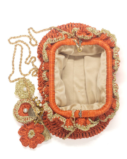 Felt interior lining of Palette by Rishma Orange Pouf Bag
