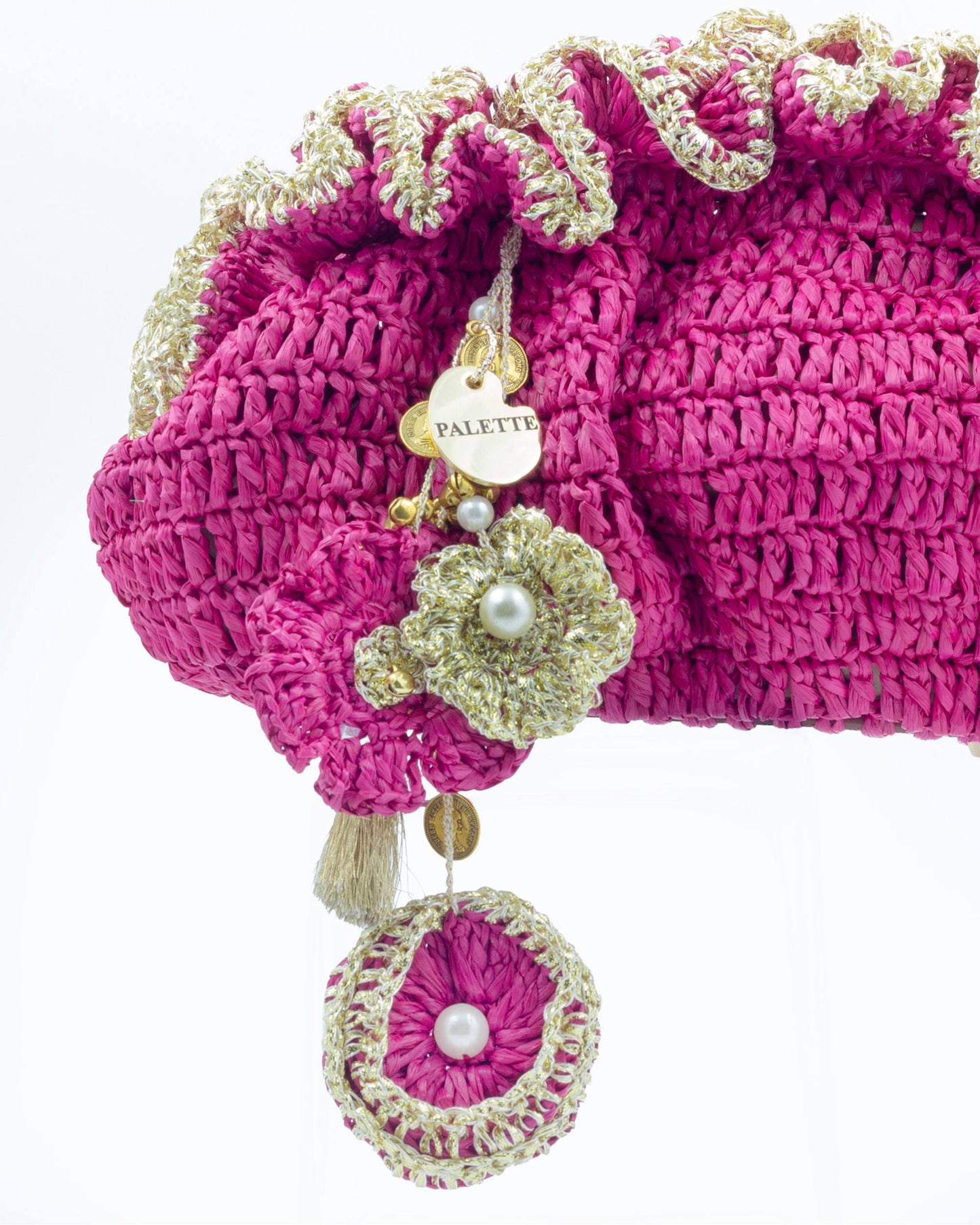 Close-up of hand crochet stitching and crystal beads on Palette by Rishma Pink Pouf Bag