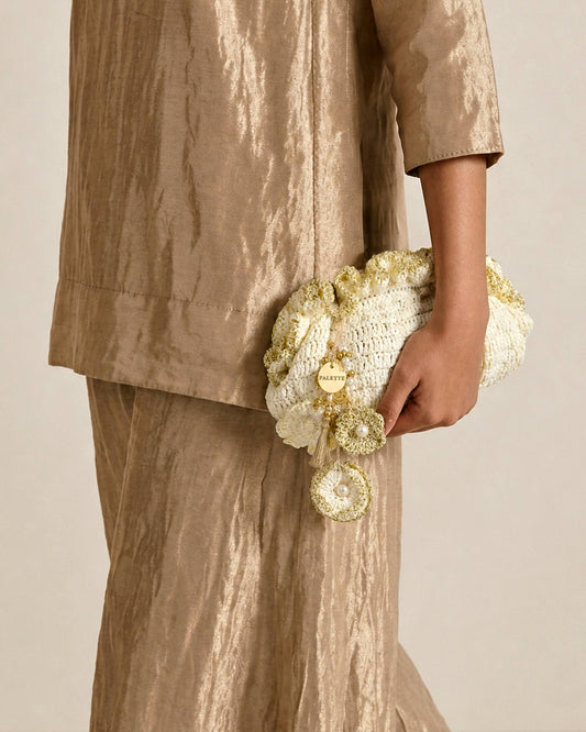 Palette by Rishma Ivory Pouf Bag styled — ivory white fête bag being worn
