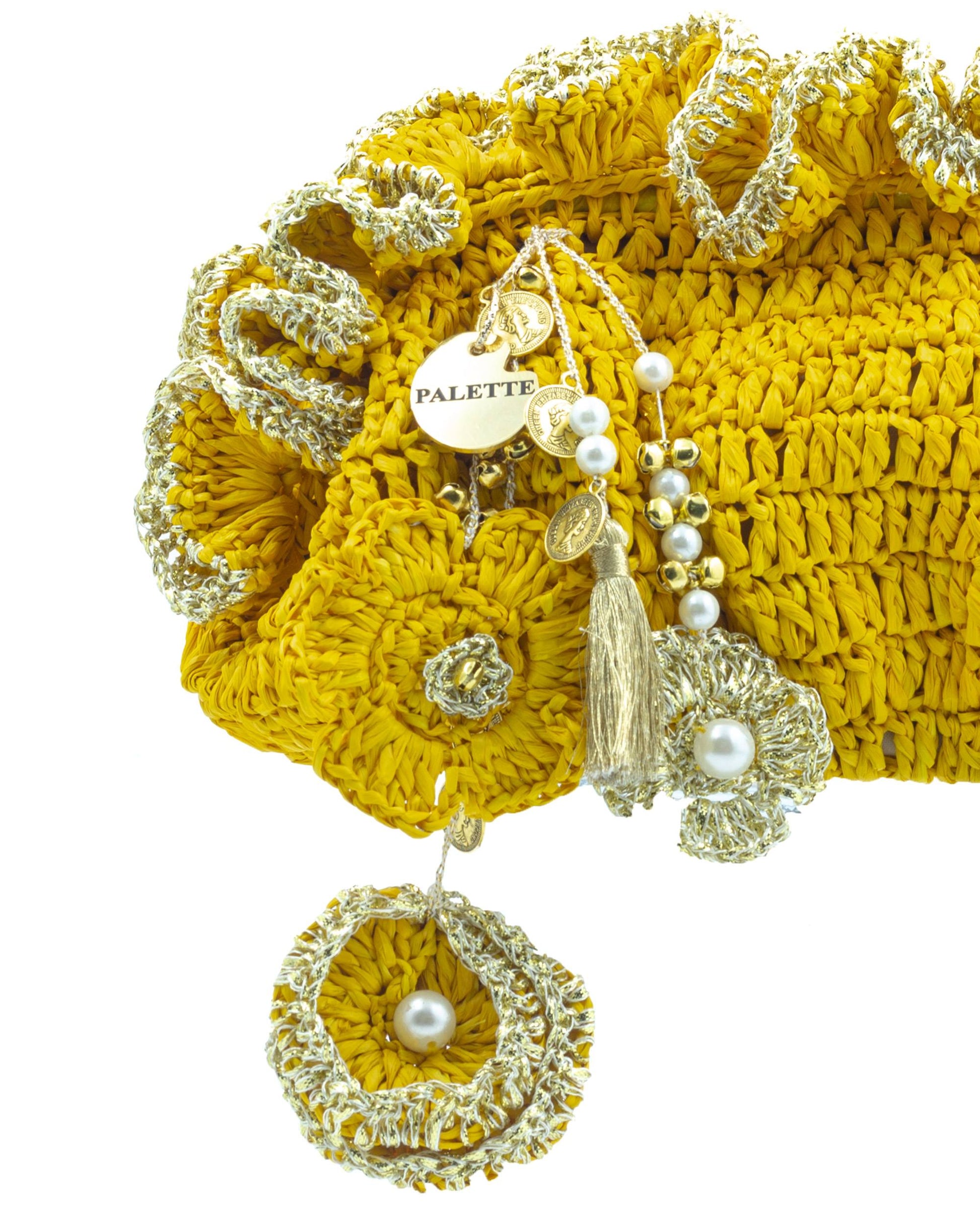 Close-up of hand crochet stitching and crystal beads on Palette by Rishma Yellow Pouf Bag