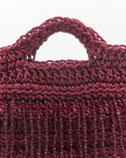 Close-up of hand crochet stitching and crystal beads on Palette by Rishma Camellia Bag
