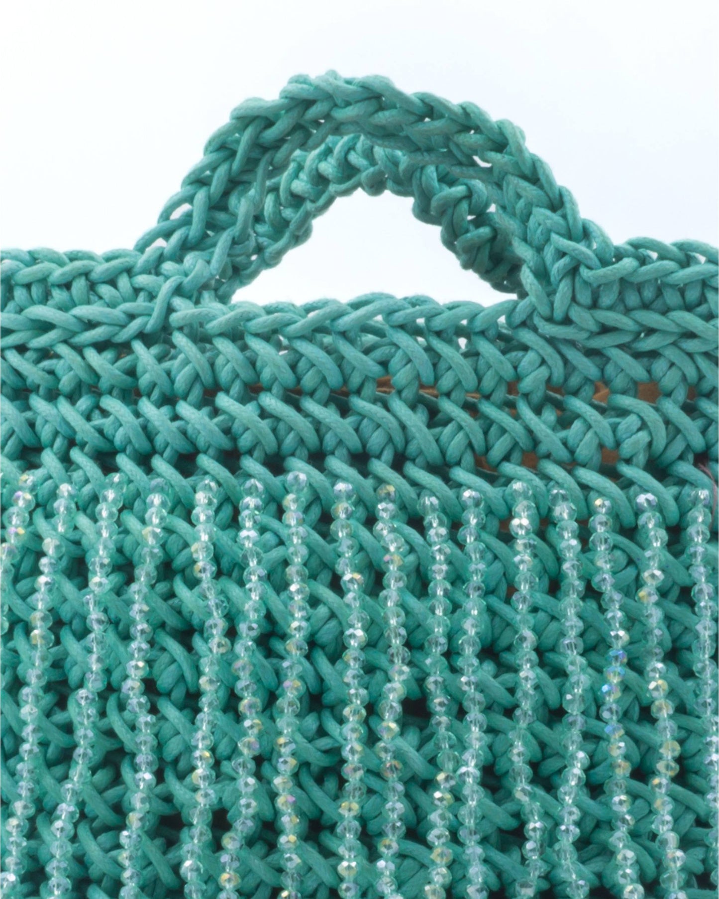 Close-up of hand crochet stitching and crystal beads on Palette by Rishma Laguna Lily Bag