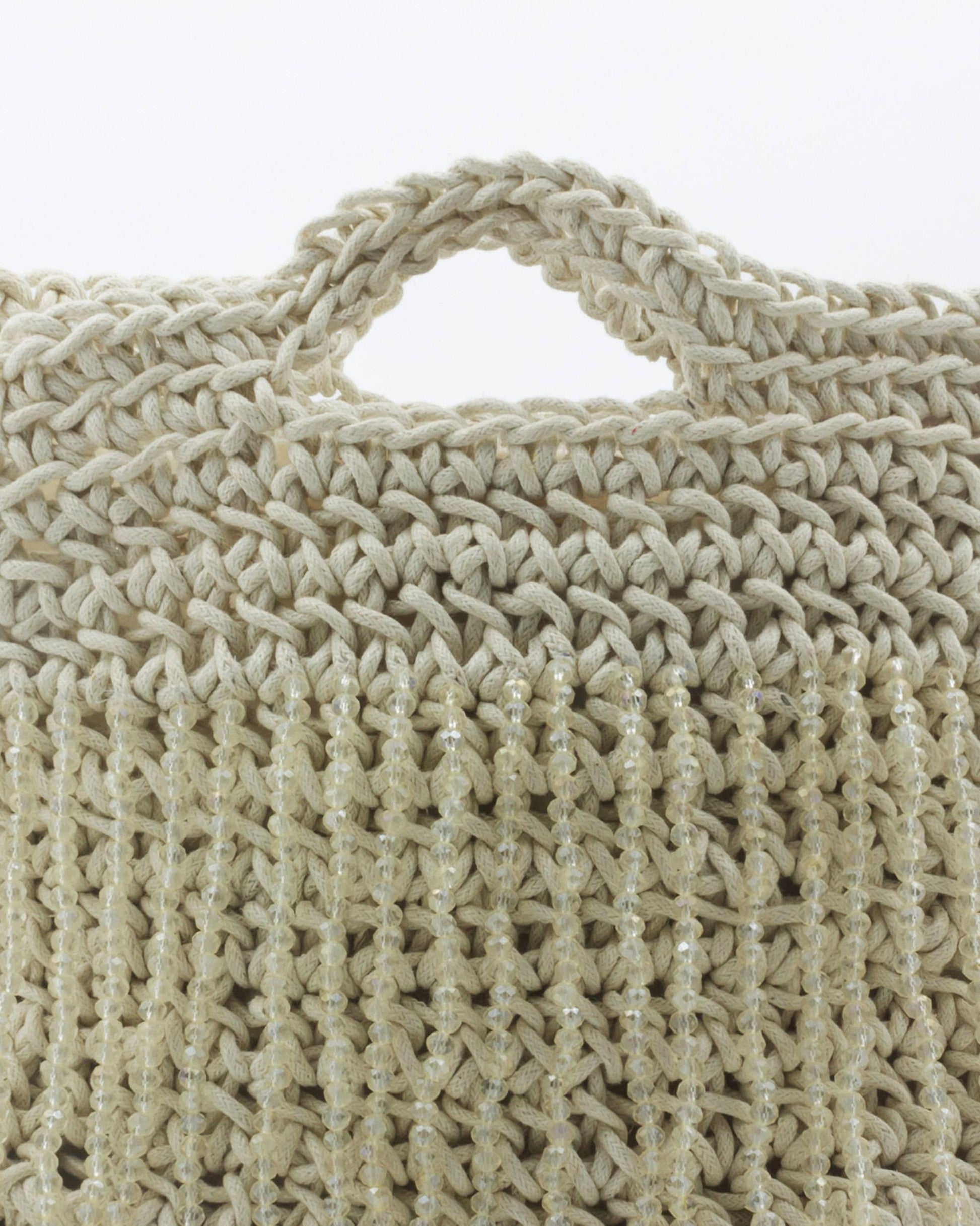 Close-up of hand crochet stitching and crystal beads on Palette by Rishma Magnolia Bag