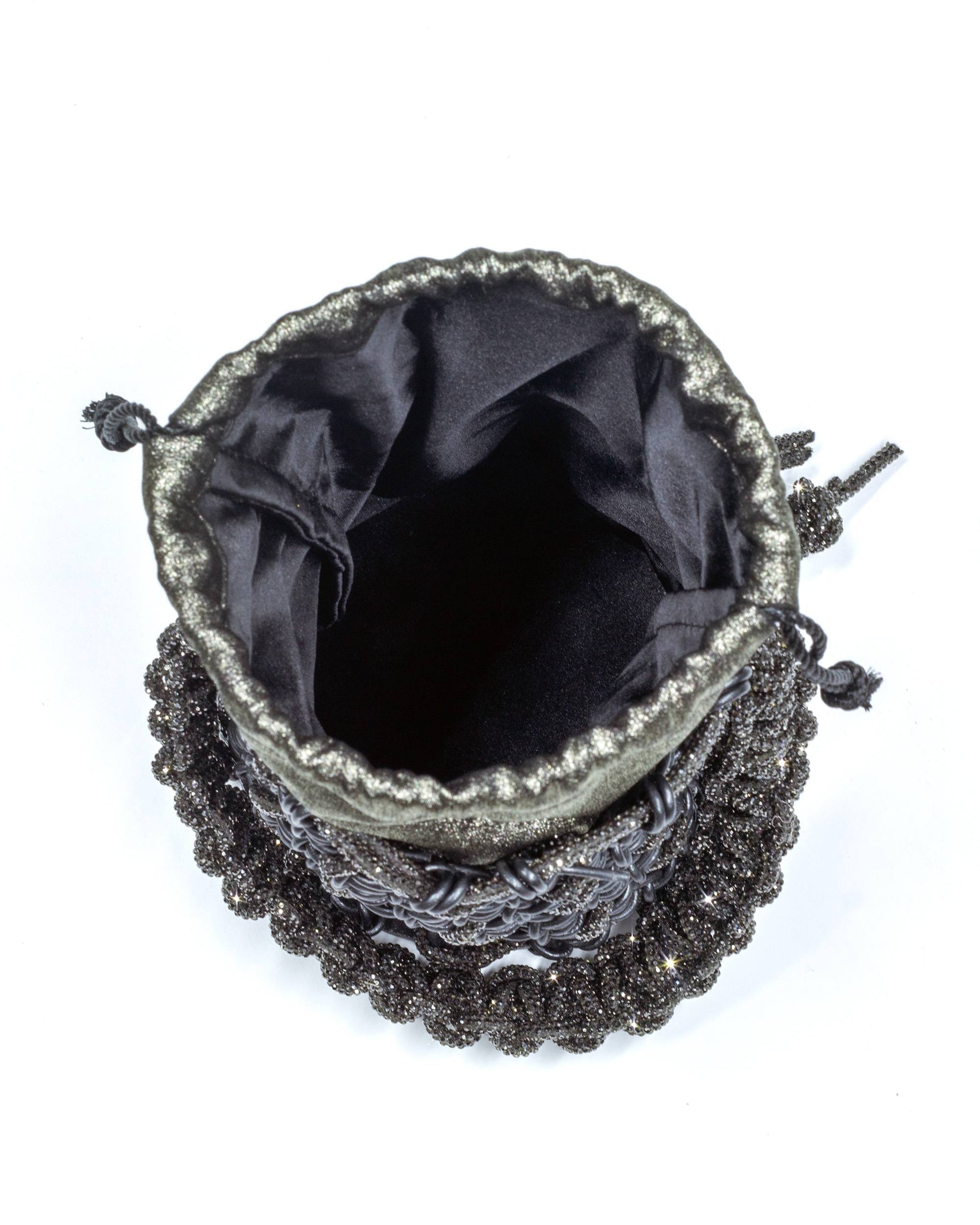 Interior of Palette by Rishma Onyx Bucket Bag — shimmer satin drawstring lining