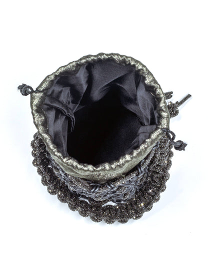 Interior of Palette by Rishma Onyx Bucket Bag — shimmer satin drawstring lining