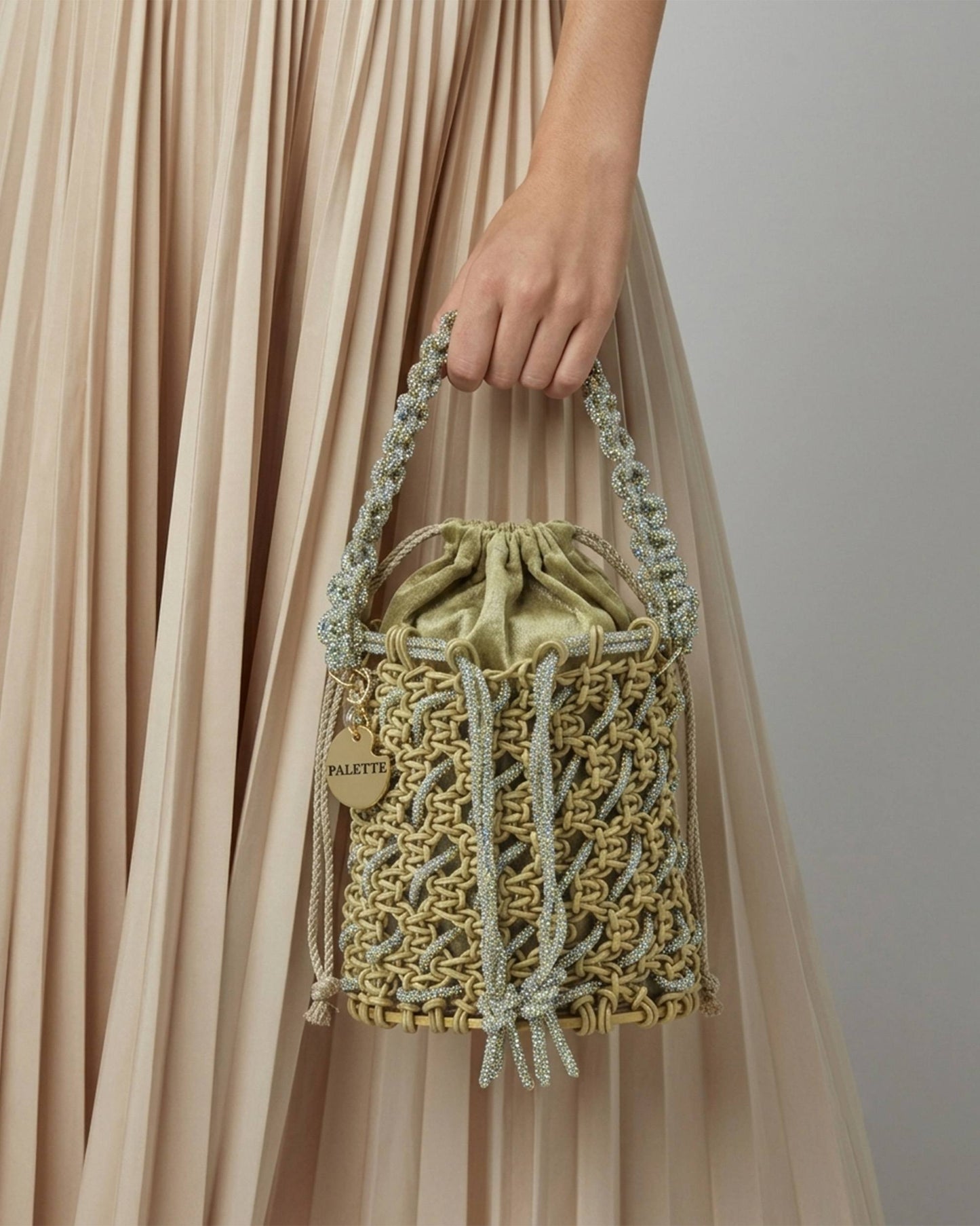 Palette by Rishma Oro Bucket Bag styled — gold lattice bag being worn
