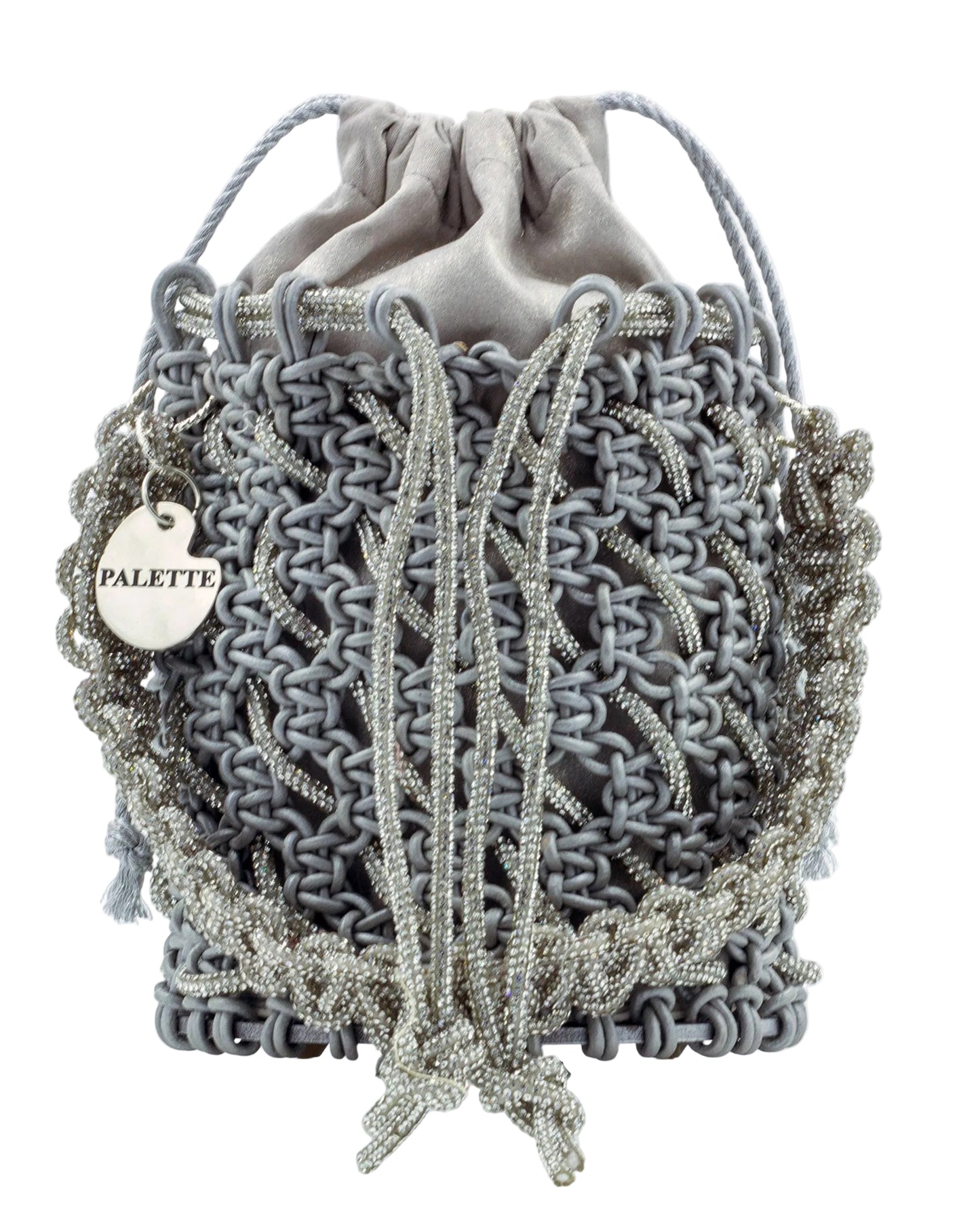 Close-up of hand-knotted macramé lattice and rhinestone detail on Palette by Rishma Sterling Bucket Bag