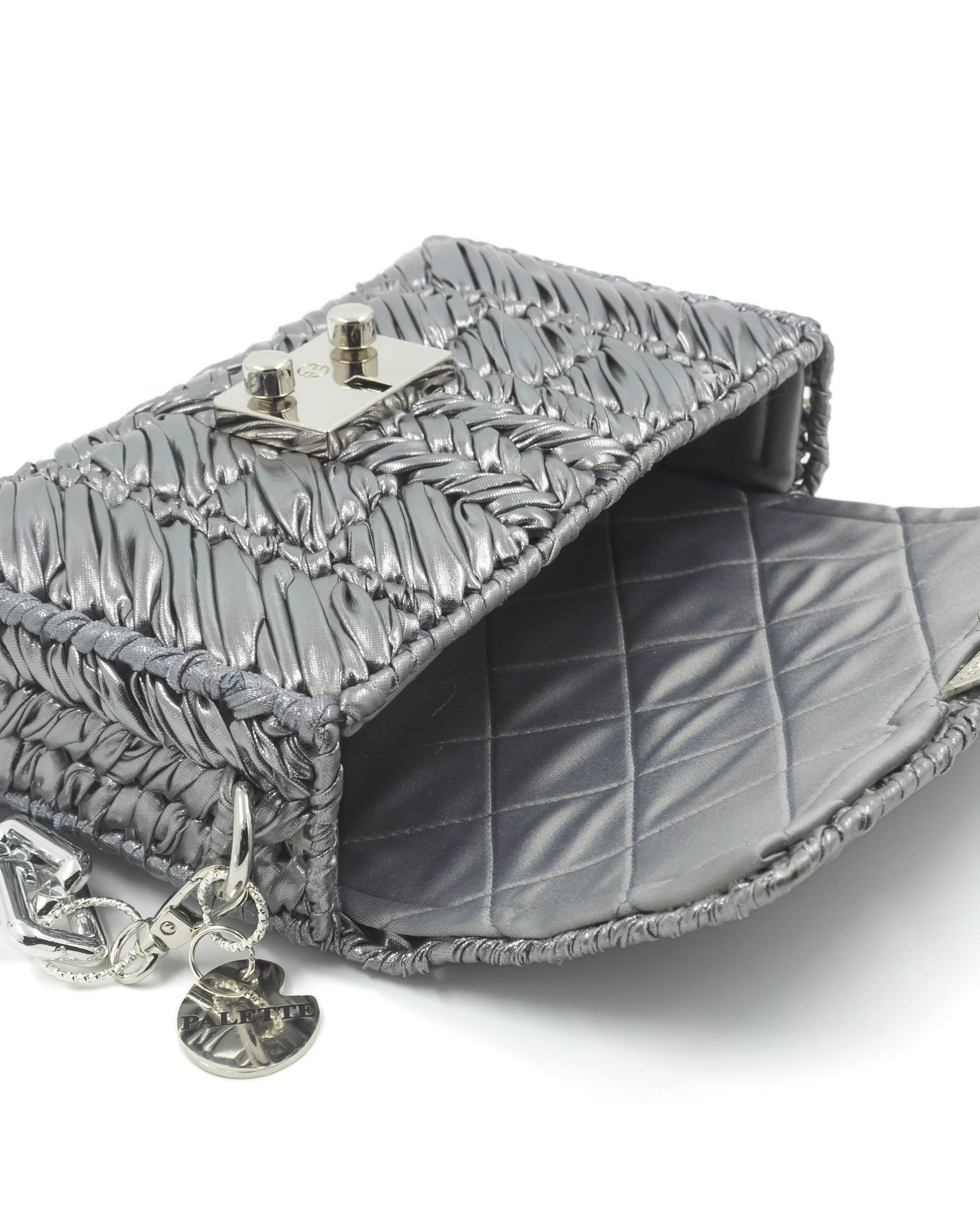 Quilted satin interior lining of Palette by Rishma Argent Bag