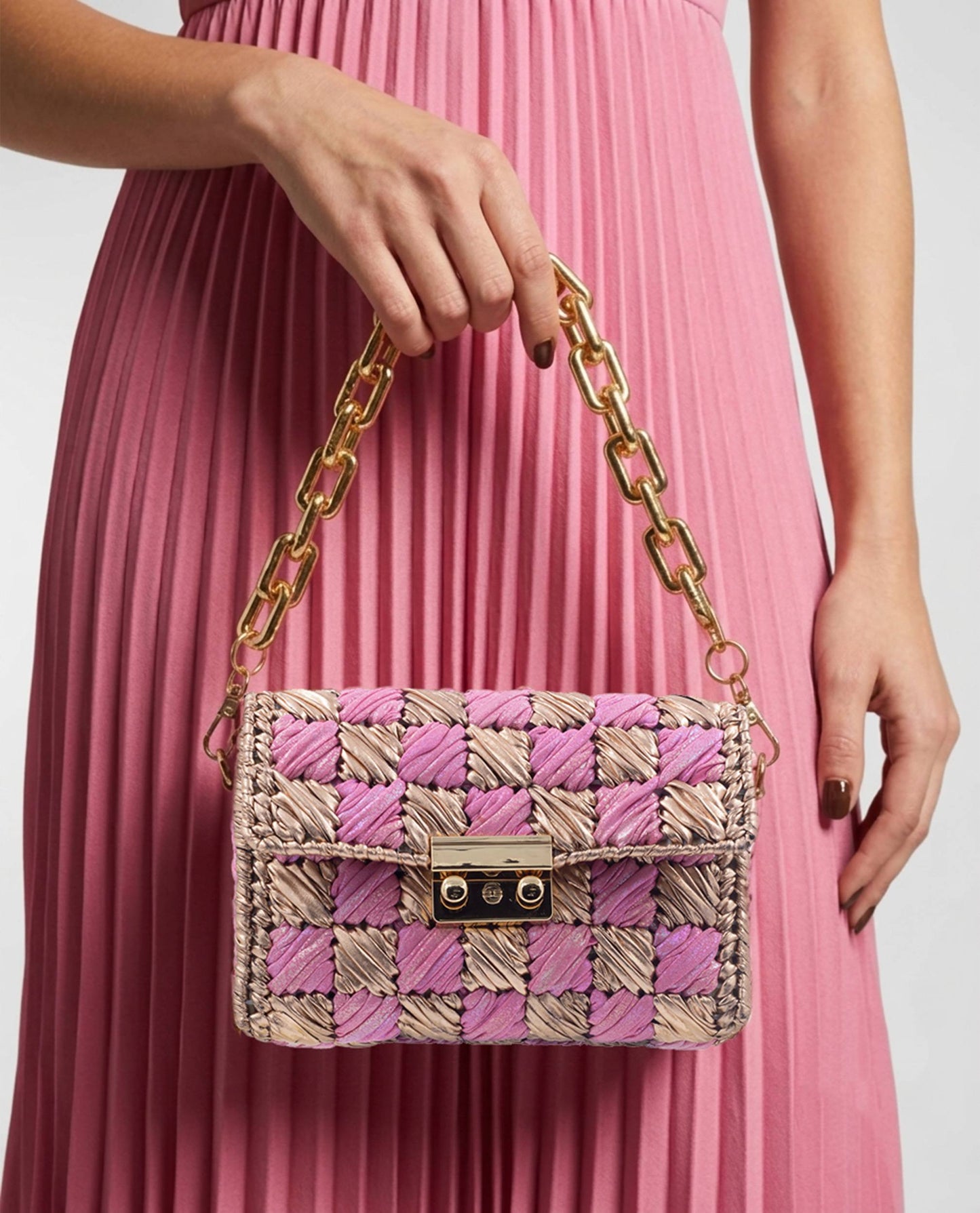 Palette by Rishma Rosé Bag worn as a clutch — soft pink and champagne evening bag in use