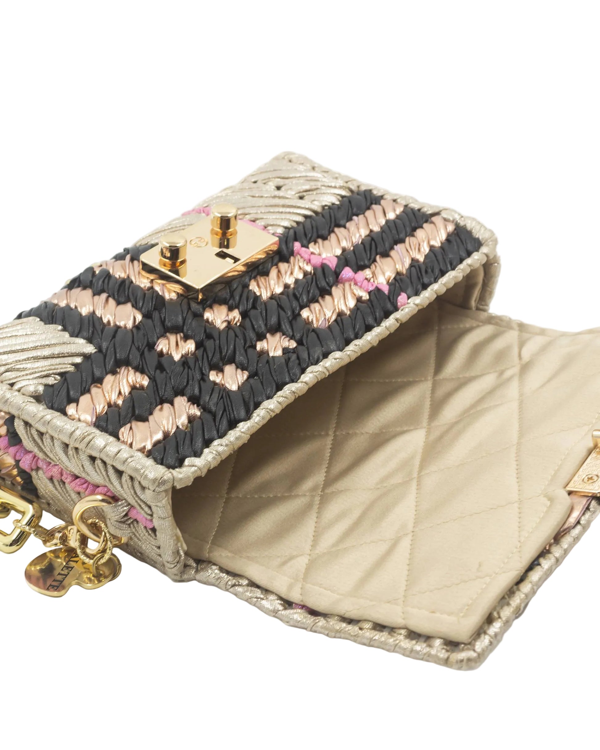 Quilted satin interior lining of Palette by Rishma Vesper Bag