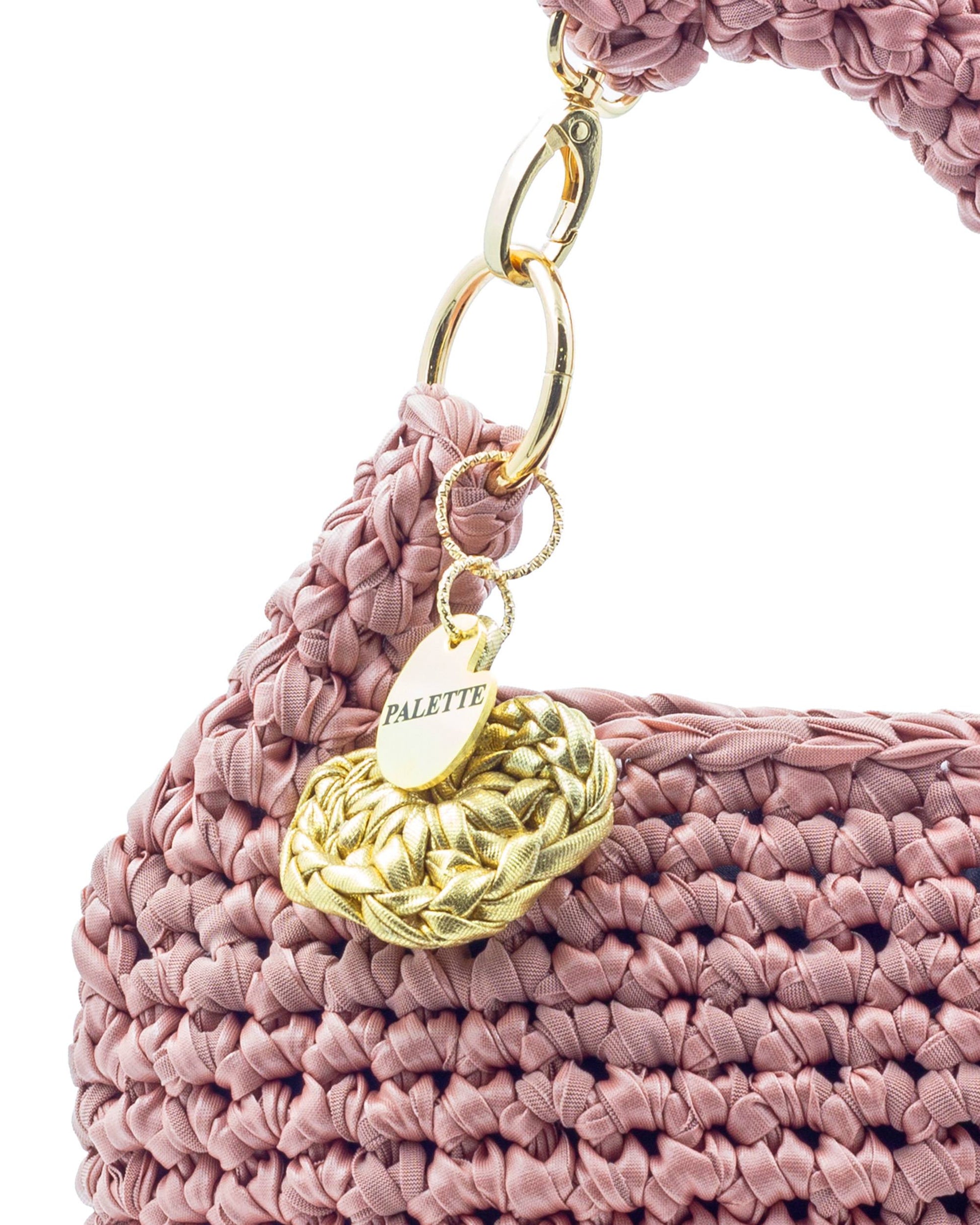 Close-up of hand crochet leatherette stitching on Palette by Rishma Blush Bag