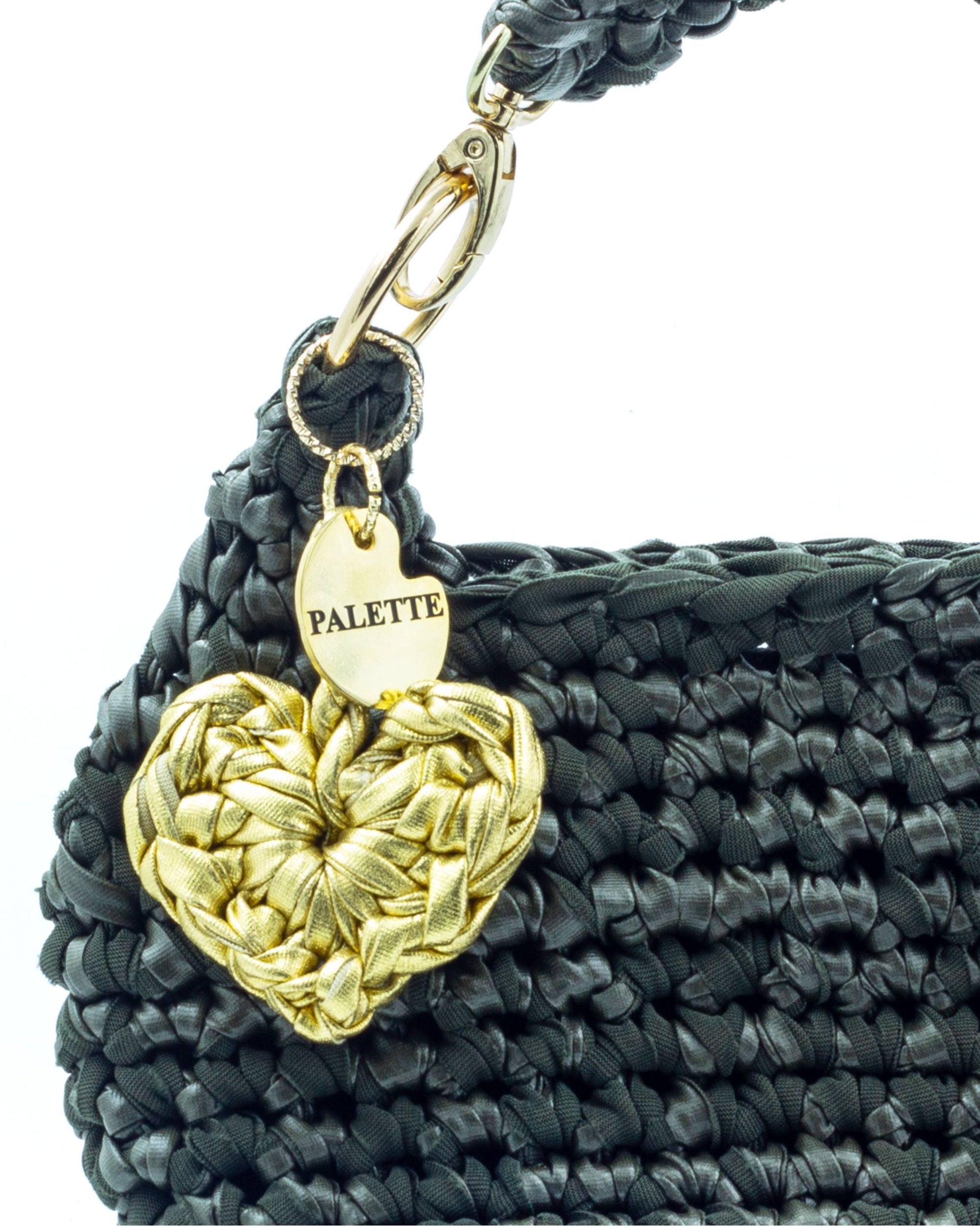 Close-up of hand crochet leatherette stitching on Palette by Rishma Sage Bag