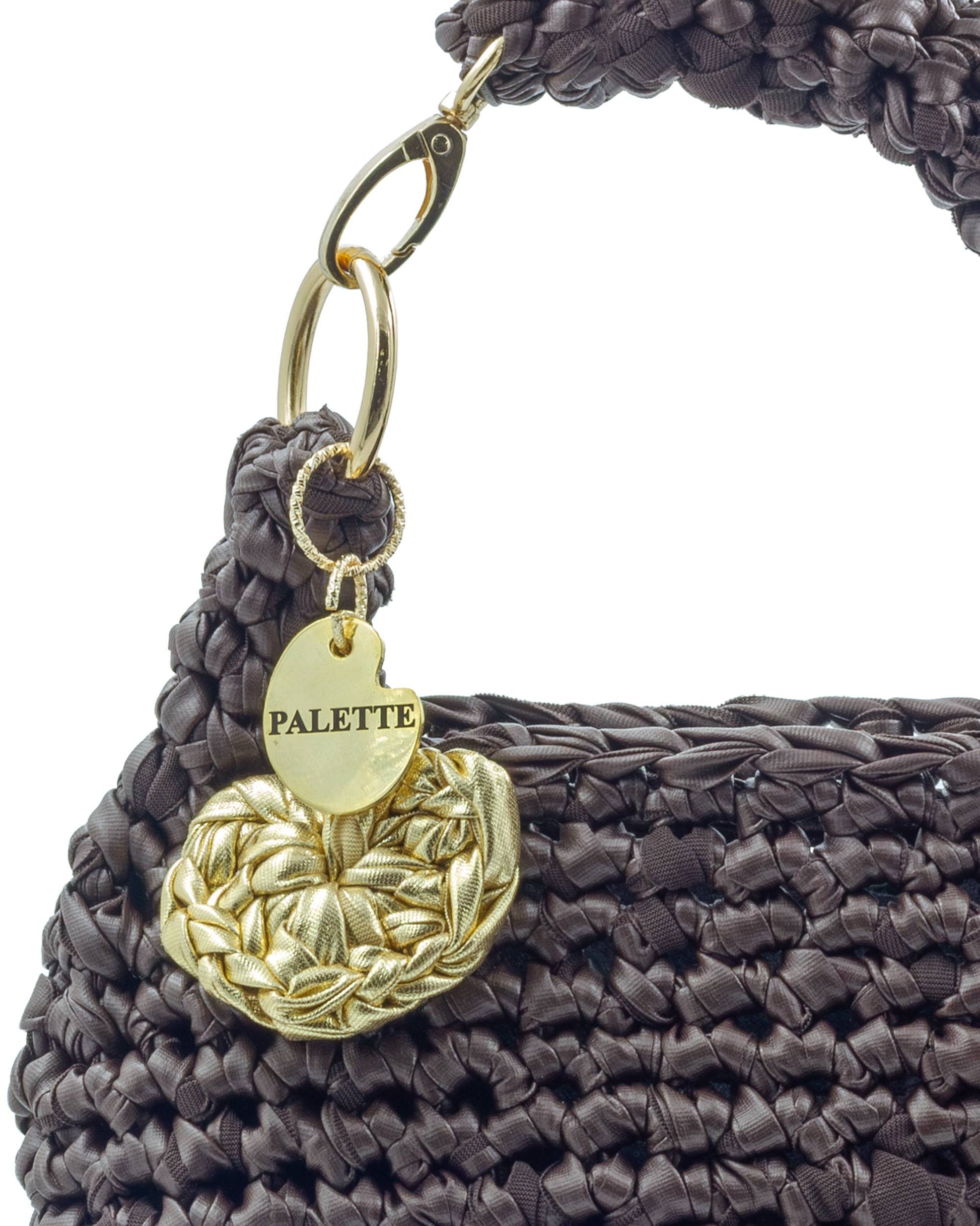 Close-up of hand crochet leatherette stitching on Palette by Rishma Umber Bag